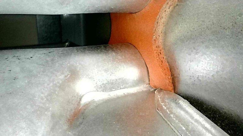 Responded to carbon monoxide alarm activation in furnace room with reported gas odor. Diagnostic testing revealed CO spikes during furnace startup despite functioning inducer and intact heat exchanger. Identified rusted burners as primary issue and replaced them under parts warranty to resolve the intermittent CO problem.