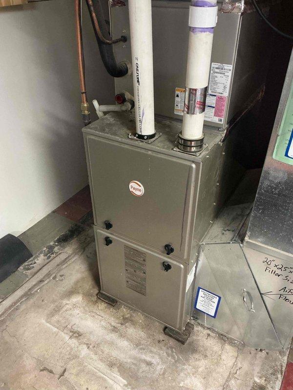 Performed comprehensive inspection on 11-year-old Payne furnace, testing all safety systems, controls, and components for proper function. Combustion analysis confirmed safe operation levels, though heat exchanger exhibits significant temperature stress consistent with age. Mini-split system (10 years old) reported as non-operational; documented condition with photos of furnace exterior and internal components.