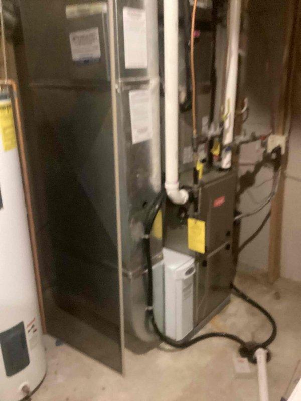 Performed inspection of two existing electric water heaters (50-gallon units from 2003 and 2007) that were not heating properly. Determined units require replacement rather than repair. Discussed consolidation options with customer, recommending replacement with a single larger capacity unit (75-80 gallon). Provided replacement estimate for new water heater installation.
