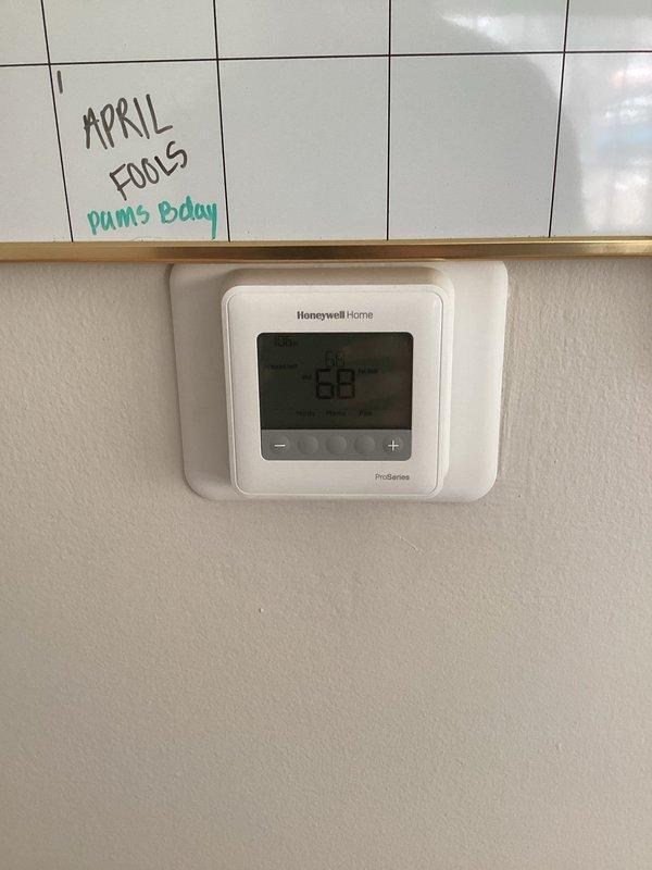 Performed 12-year-old furnace maintenance service including flame sensor cleaning and filter replacement. System diagnostics confirmed proper operation with readings within manufacturer specifications. Thermostat was verified functioning correctly.