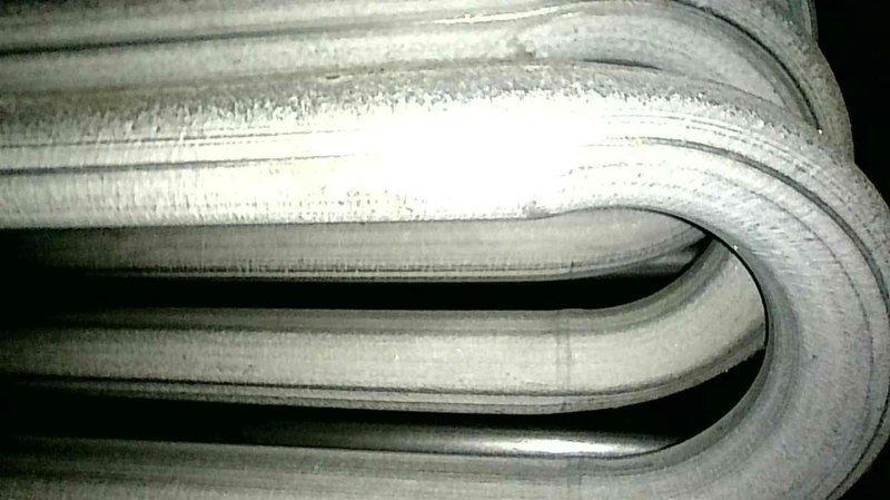 Diagnosed furnace issue where unit wouldn't stay lit due to heavily contaminated flame sensor and excessive dust accumulation in combustion area. Performed thorough cleaning of flame sensor rod and vacuumed out dust/debris from panel and surrounding components. After service, verified proper operation with successful ignition and sustained flame, resolving the no-heat condition.