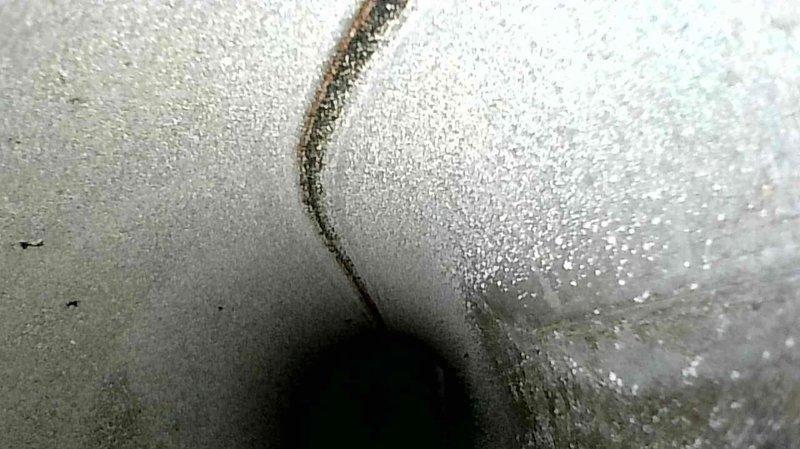 Diagnosed furnace issue where unit wouldn't stay lit due to heavily contaminated flame sensor and excessive dust accumulation in combustion area. Performed thorough cleaning of flame sensor rod and vacuumed out dust/debris from panel and surrounding components. After service, verified proper operation with successful ignition and sustained flame, resolving the no-heat condition.