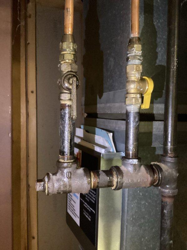 Responded to gas leak detected during Centerpoint home audit. Located and repaired gas leak, replaced deteriorated shutoff valve on copper supply line, and recommended replacement of water heater ignitor due to signs of wear.