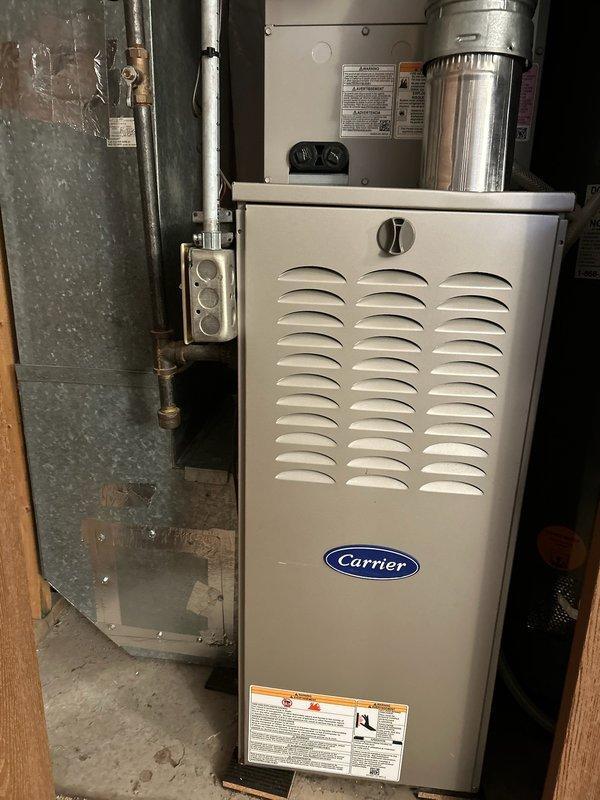 Resolved excessive noise coming from 5-year-old Carrier furnace blower wheel by addressing high static pressure in the ductwork. Removed blower assembly, modified ductwork to eliminate noise, and recommended installation of less restrictive air filter to improve system efficiency and prevent recurrence.