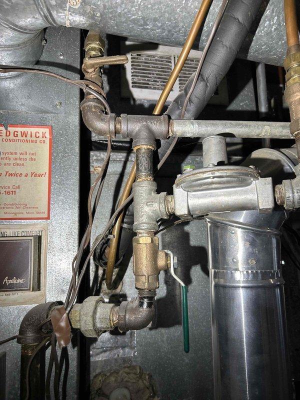 Responded to no heat service call for 15+ year old furnace exhibiting intermittent operation. Diagnostic inspection revealed two cracks in heat exchanger, presenting a significant safety hazard. Recommended complete heat exchanger replacement or full furnace replacement as appropriate remedial options given system age and condition.