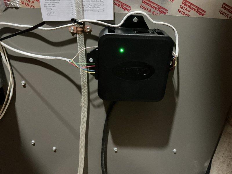 Minnetonka, MN - Responded to warranty call for malfunctioning furnace. Diagnosed faulty RDS board and confirmed need for 27A02 NON-Comm board replacement. After installation, verified system operation with control board showing proper functionality as evidenced by illuminated green indicator light. Furnace is now fully operational.