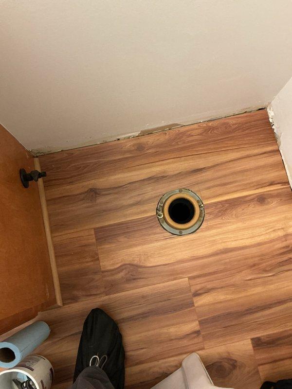 Conducted follow-up service appointment for previously sold repair. Unable to complete installation of two toilets as flooring work must be completed first. Shower installation delayed pending arrival of compatible trim kit expected by week's end. Job remains incomplete; scheduled to return once customer has obtained proper parts and completed prerequisite flooring installation.