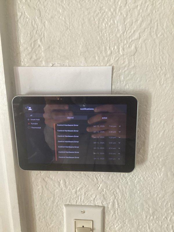 Responded to customer complaint regarding recurring "Control Hardware Error" code 125 on thermostat and efficiency concerns. Diagnosed thermostat malfunction and ordered replacement unit. Adjusted humidification settings to 30% maximum to reduce indoor moisture and prevent window icing. Modified heat pump balance point from 20°F to 35°F to transition to gas furnace operation sooner during cold weather for improved efficiency. Documented damage to outdoor unit coils/fins with photos for future follow-up.