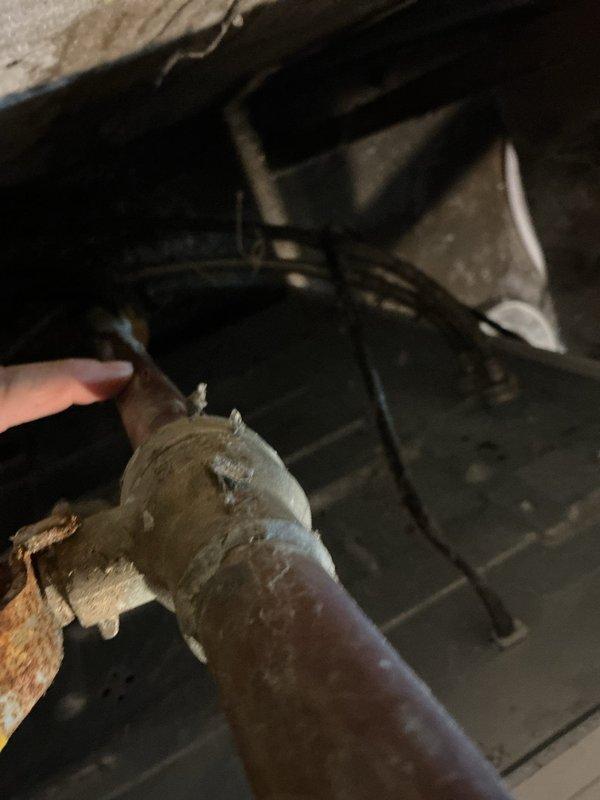 Responded to emergency call for burst copper pipe after water meter. Upon inspection, discovered frozen copper pipe had burst, requiring sectional replacement. During comprehensive system check, identified and capped an additional leak in an old galvanized line, restoring water service to the home.