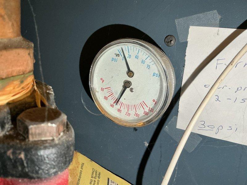 Performed diagnostic assessment of 30+ year old Weil-McLain CG boiler exhibiting pressure loss and loud banging noises. Inspection revealed severe limescale buildup on heat exchanger, excessive flue temperatures exceeding 400°F, and water temperatures surpassing Aquastat setting (exceeding 220°F). These conditions are causing dangerous overheating and the reported noise issues. Scheduled estimate for complete boiler replacement.