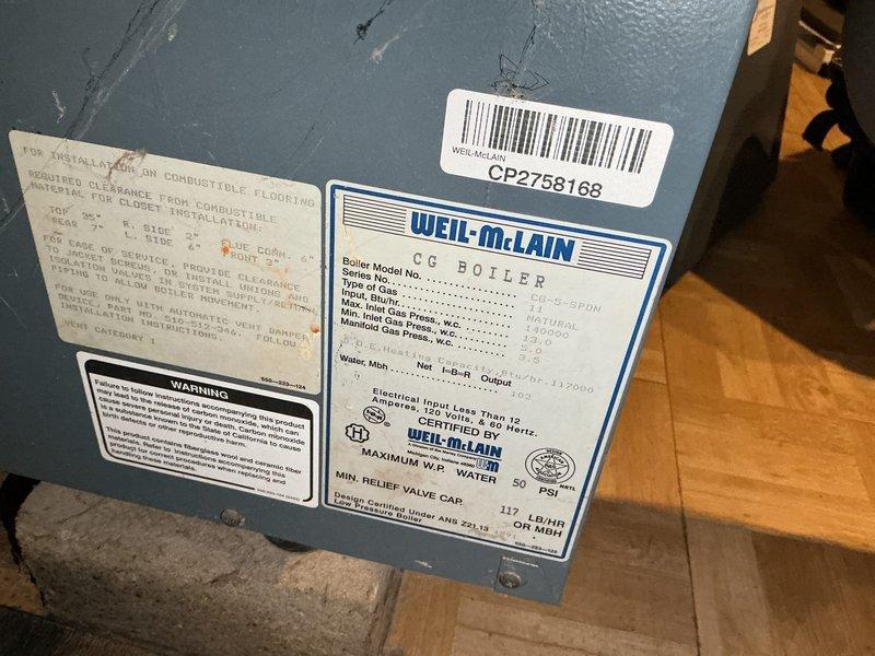 Performed diagnostic assessment of 30+ year old Weil-McLain CG boiler exhibiting pressure loss and loud banging noises. Inspection revealed severe limescale buildup on heat exchanger, excessive flue temperatures exceeding 400°F, and water temperatures surpassing Aquastat setting (exceeding 220°F). These conditions are causing dangerous overheating and the reported noise issues. Scheduled estimate for complete boiler replacement.