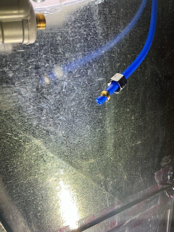 Addressed humidifier leak issue caused by over-tightened copper compression fitting on solenoid valve hose. Replaced damaged fitting and successfully stopped leak. Scheduled follow-up appointment for installation of new controller and outdoor sensor, with plan to either install nylon compression fitting or add hardening piece to hose for permanent solution.