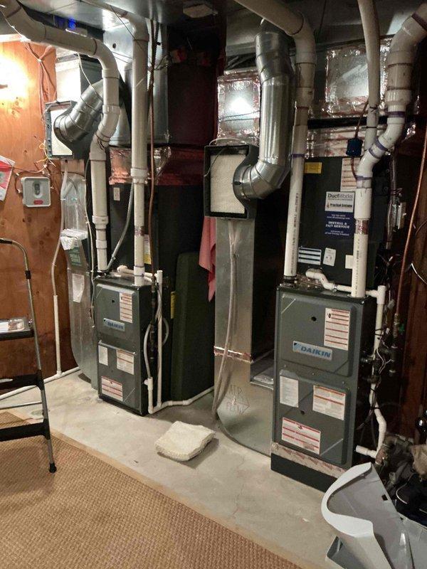 Responded to recurring humidifier leak issue. Discovered water panel had fallen inside ductwork, causing water to drip from bottom fastener instead of flowing through drain line. Removed dislodged panel and installed new customer-provided water panel to resolve the issue.