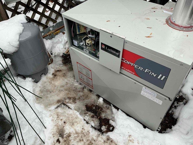 Responded to warranty service call for a recently installed Lochinvar snow melt boiler experiencing short cycling issues (running 1 minute, off 10 minutes). Determined the target slab temperature was set too low at 36°F, causing the system to short cycle due to proximity to ambient air temperature. Adjusted target temperature to 45°F and confirmed proper operation with the boiler maintaining the 180°F set point without short cycling.