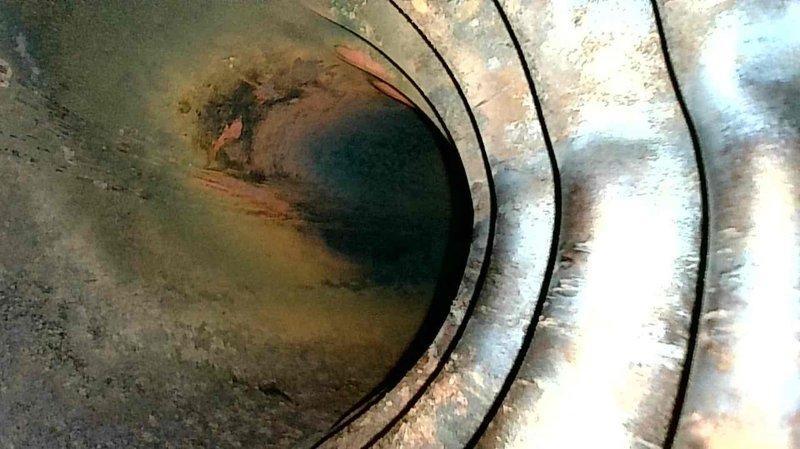 Diagnosed furnace non-heating issue caused by a plugged pressure switch hose preventing ignition. Cleared the obstruction, performed comprehensive system inspection including heat exchanger evaluation, flame sensor cleaning, and verification of proper condensate drainage. System now operating normally with restored heating function.