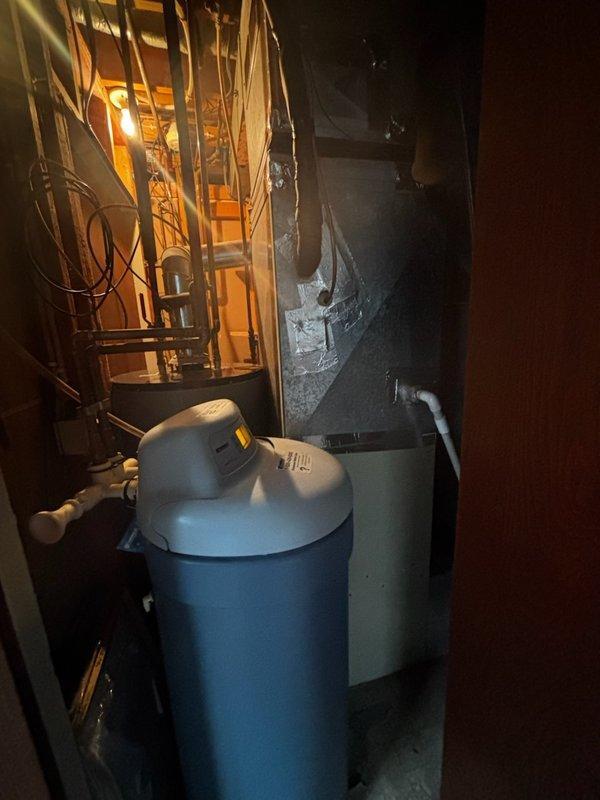 Responded to no heat complaint in residence with 26-year-old gas furnace. Diagnosed seized draft motor and replaced it during service call. Noted potential gas valve failure and recommended furnace replacement due to system age and condition.