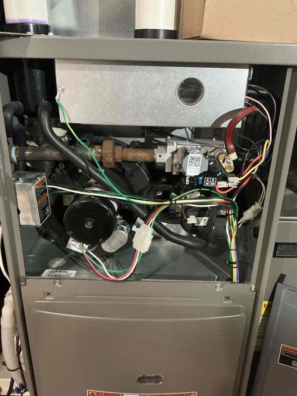 Responded to no-heat call for a 7-year-old Lennox furnace displaying a code 2 error (pressure switch closed with inducer not running). Although unable to recreate the issue during diagnosis, replaced pressure switches under parts warranty based on customer's consistent error reporting. Inspected pressure switch tubing for moisture issues but found none. After component replacement, cycled furnace multiple times to confirm proper operation and verified all other components were functioning correctly.