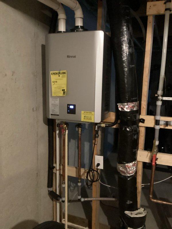 Performed scheduled maintenance service on Rinnai tankless water heater. Completed comprehensive system flush to remove mineral buildup and sediment, restoring optimal performance and efficiency. Inspected all connections, venting system, and verified proper operation after service.