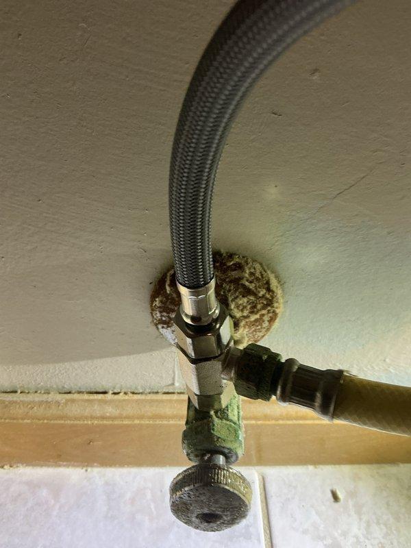 Performed comprehensive toilet service at residence with four bathrooms. Diagnosed continuously running bidet and repaired water supply connection showing mineral buildup and corrosion. Completed tank rebuilds on three additional toilets requiring installation, including proper mounting of shutoff valves and replacement of deteriorated supply lines. Installed new toilet seats as requested.