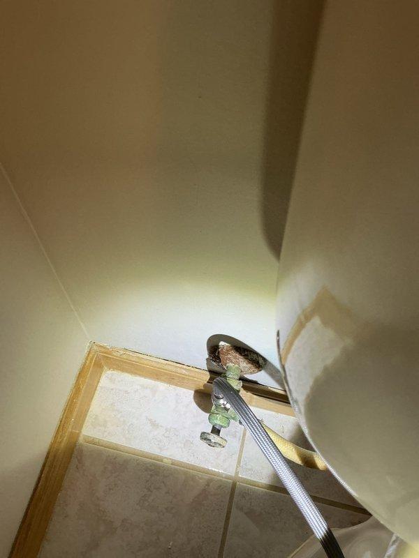 Performed comprehensive toilet service at residence with four bathrooms. Diagnosed continuously running bidet and repaired water supply connection showing mineral buildup and corrosion. Completed tank rebuilds on three additional toilets requiring installation, including proper mounting of shutoff valves and replacement of deteriorated supply lines. Installed new toilet seats as requested.