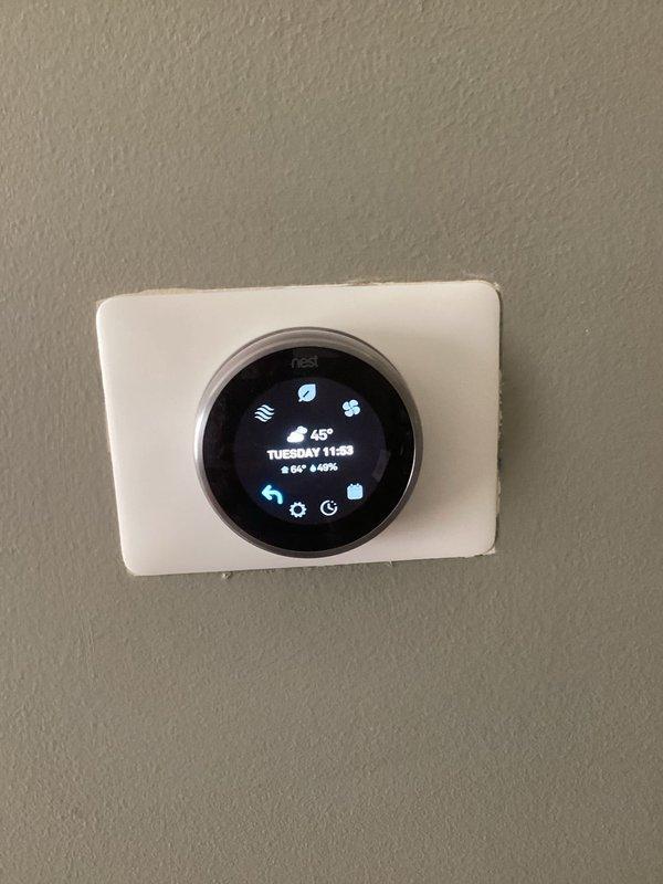 Responded to no-heat call for 2013 furnace system. Upon arrival, found unit displaying fault code indicating limit switch circuit malfunction. Performed comprehensive diagnostic testing on furnace components including blower motor operation, control board functionality, and safety switch circuits. Identified failed blower motor as root cause of limit switch circuit failure rather than control board issue. Noted evidence of moisture intrusion with visible rusting and corrosion on cabinet interior, indicating potential heat exchanger or condensate drainage concerns requiring further evaluation.

Inspected humidifier assembly and found evaporator pad severely clogged with mineral deposits and deteriorated material, restricting airflow and water distribution. Pad showed significant discoloration, buildup throughout honeycomb mesh, and structural damage at lower corner with white crusty deposits visible. Verified Nest thermostat programming and settings; unit calling for heat appropriately 