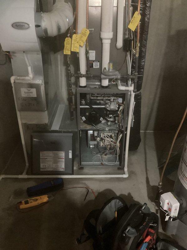 Responded to no heat call on 8-year-old furnace system experiencing loud clunking noise during heating cycle startup. Upon diagnostic inspection, identified failed inducer motor assembly causing operational failure and abnormal noise. Removed defective inducer assembly, installed new replacement unit, verified proper draft proving switch operation, tested system through multiple heating cycles, and confirmed quiet operation and normal heat output with no further issues.