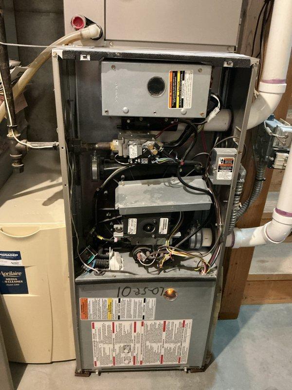 Responded to no heat call on 19-year-old residential gas furnace. Diagnosed intermittent voltage supply to inducer motor from control board. Attempted reconnection, but inducer motor failed to start. Due to age of unit, multiple component failures, and cost of repairs versus replacement, recommended and completed full furnace replacement.