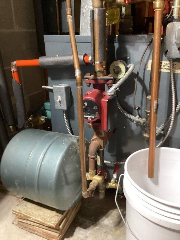 Diagnosed 20-year-old boiler system not producing heat due to overheating from insufficient water circulation and a leaking relief valve. Opted against adding water to the hot cast iron boiler to prevent damage. Ordered new relief valve and recommended system bleeding to restore proper circulation, with contingency plan for possible circulator pump replacement if needed.