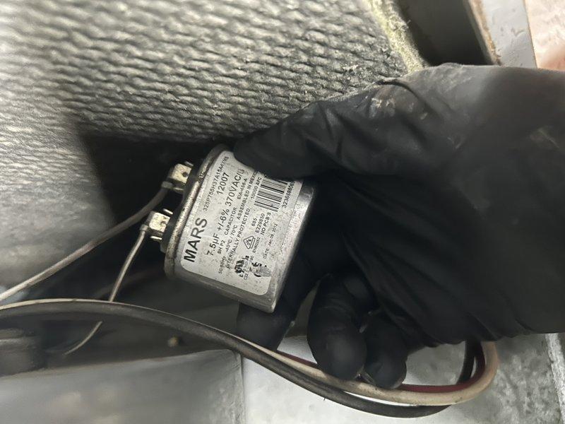 Performed standard oil furnace tune-up including nozzle replacement and filter change. Inspected capacitor and found it in working condition. Identified and addressed oil leak at filter housing by replacing filter and gaskets, with no residual leakage observed after repair. Advised customer that oil tank gauge readings appear inaccurate, though customer is aware of current oil levels.