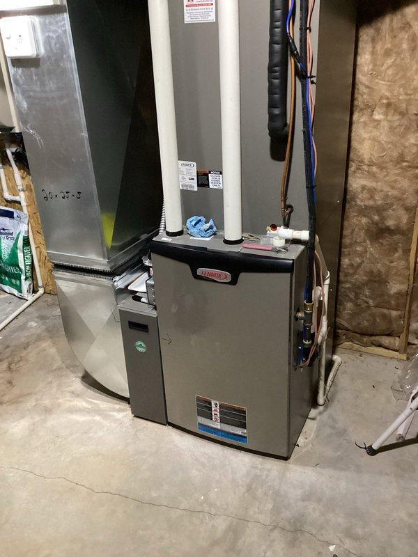 Diagnosed homeowner's no-heat complaint and found a non-functioning smart thermostat despite proper power supply to the unit. Determined the thermostat control board was failing and installed a new S40 thermostat. System is now operating properly with both zones functioning as designed on the 2016 Lennox natural gas furnace.