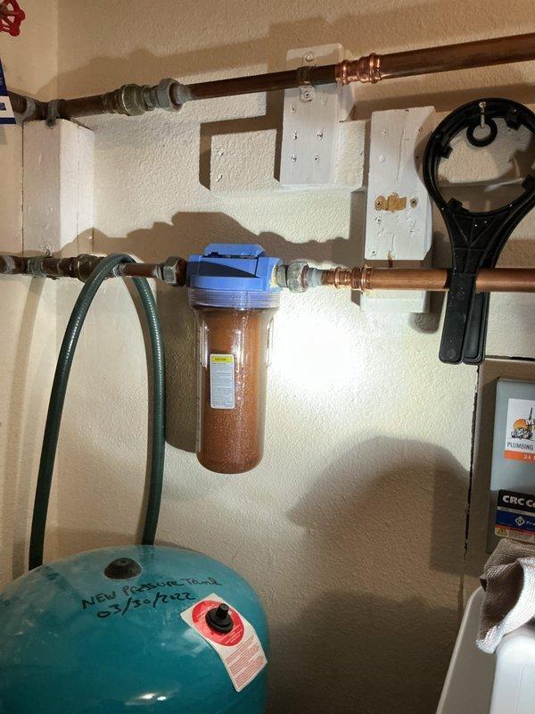 Responded to emergency service call for water leak on filtration system. Upon inspection, identified loose filter housing as source of the leak. Tightened filter housing to manufacturer specifications, which successfully resolved the leak. System tested and confirmed proper operation with no further water loss.