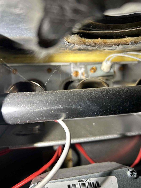 Responded to no-heat call for 3-year-old furnace that failed to operate after power outage. Diagnosed code 33 (faulty high limit) with voltage testing showing 28V across limit switch and infinite resistance when measured with ohmmeter. Found severely clogged and dirty filters contributing to overheating condition. Replaced high limit switch and restored normal operation.