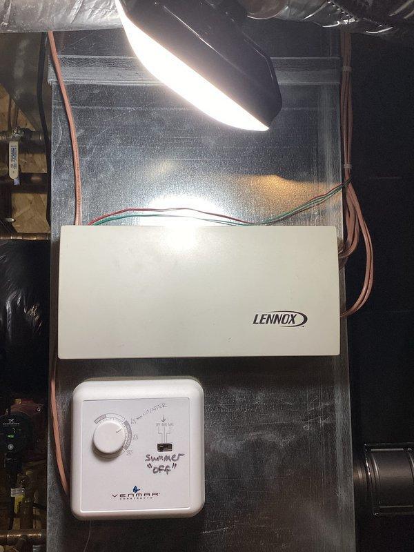 Diagnosed zone control system failure causing inadequate heating in upstairs zone (Zone 2). Testing revealed thermostat communication issues with zoning system, leading to heating deficiency and excessive window condensation. Determined zone control board is malfunctioning with intermittent power cycling; recommended replacement of zone control board and upstairs zone thermostat.