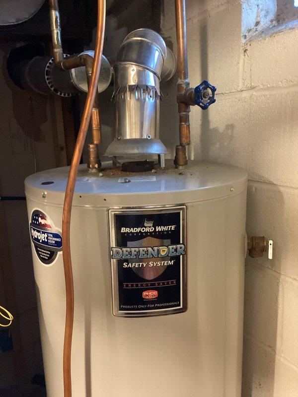 Replaced customer-supplied Rheem Performance water heater (Model #XG50T06EC38U1) after original Bradford White unit developed tank leak. Installation included connecting all plumbing lines and testing system. Post-installation inspection confirmed proper operation with no leaks detected.