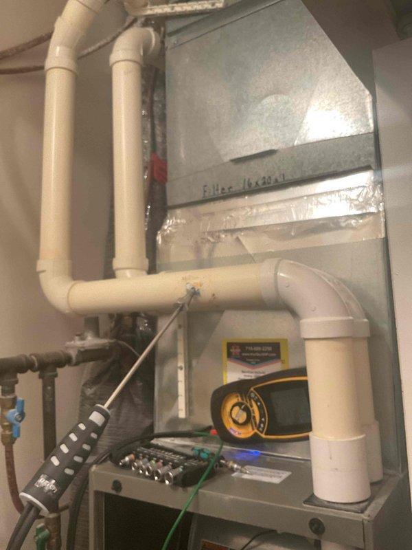 Performed annual maintenance on 13-year-old furnace including filter replacement (16x20x1) and comprehensive tune-up. Diagnostic testing with dual port manometer showed pressure readings of 3.25/3.26. Replaced dirty filter to restore proper airflow and system efficiency.