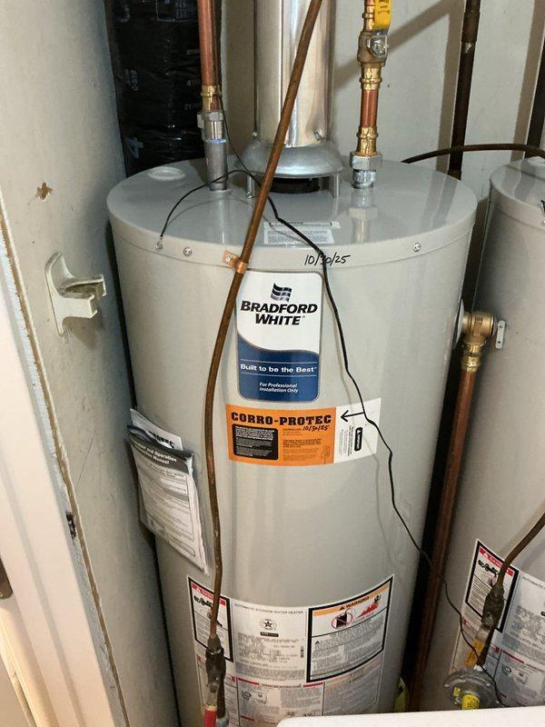 Completed installation of two Bradford White 40-gallon tall atmospheric natural gas water heaters and two cabinet-style water softeners with inline carbon filters. Installed complete connection assembly including press dielectric unions, press ball valves, gas regulators, and new electric anode rods. All units were properly mounted and secured with threaded rod support system, and a Tru Gap air gap was installed per code requirements.