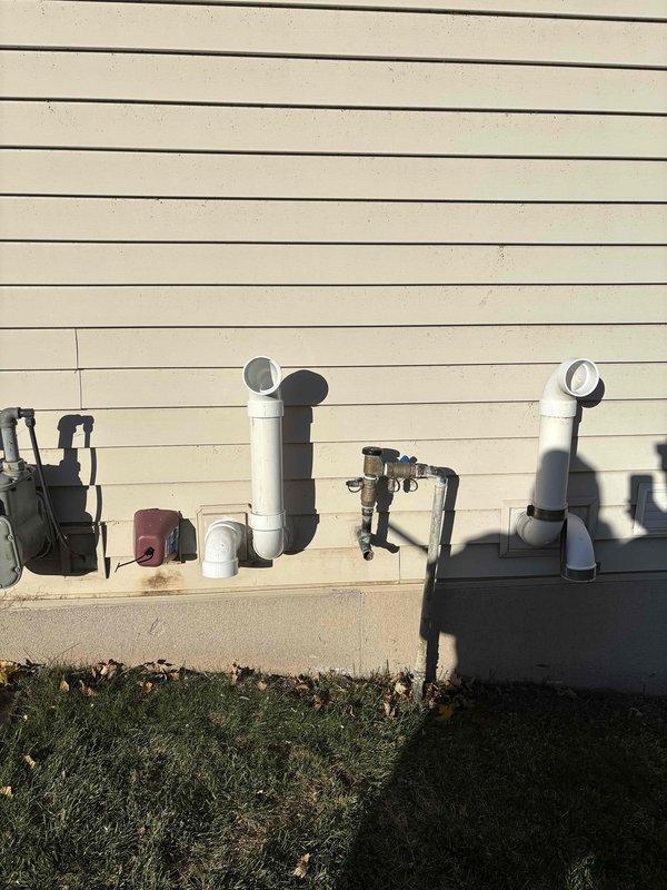 Responded to customer follow-up regarding incomplete installation of tankless water heater. Completed the required termination of exhaust venting by properly installing and securing the two PVC vent pipes on exterior wall with appropriate vent caps. All ventilation is now properly terminated according to manufacturer specifications and local code requirements.