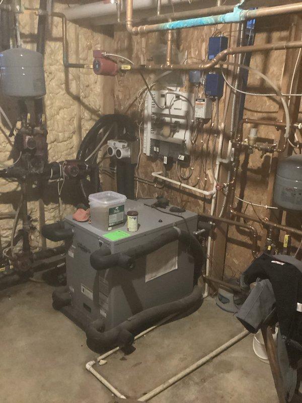 Performed scheduled maintenance tune-up on IBC HC boiler system that provides hot water and serves as backup to geothermal system. Cleaned heat exchanger thoroughly as part of Family Rewards agreement maintenance. Inspection revealed system in good working condition with no issues or problems identified.