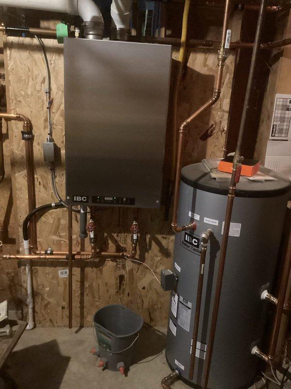 Performed scheduled maintenance tune-up on IBC HC boiler system that provides hot water and serves as backup to geothermal system. Cleaned heat exchanger thoroughly as part of Family Rewards agreement maintenance. Inspection revealed system in good working condition with no issues or problems identified.