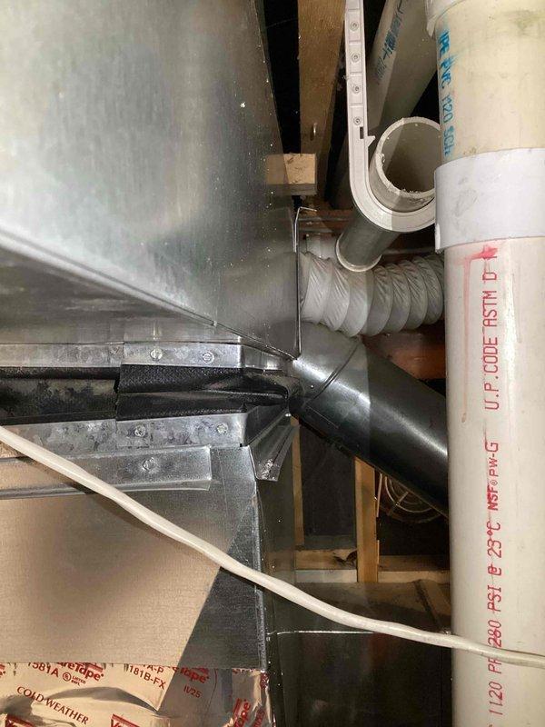 Responded to warranty service call for condensate leak. Identified wet furnace filter and rust residue caused by improperly pitched chimney creating backflow. Performed necessary rework on chimney components to correct drainage issue and ensure proper condensate flow.