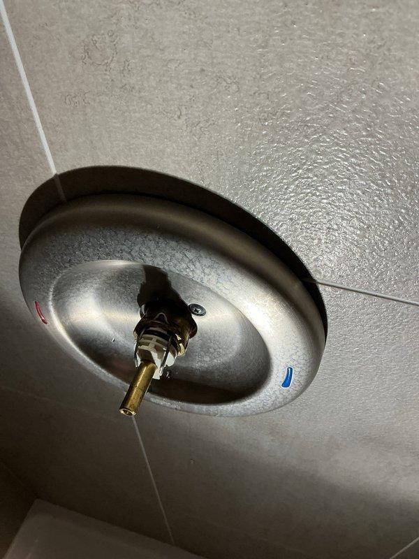 Responded to emergency call for frozen pipes resulting from furnace failure. Inspected property and found multiple frozen fixtures including toilets, kitchen sink, vanity sink drain, and a damaged shower cartridge. Replaced shower cartridge and verified no pipe breakage was evident at kitchen sink leak location. Provided customer with preventative instructions to leave cabinets open to facilitate thawing and monitor for any additional damage once system fully thaws.