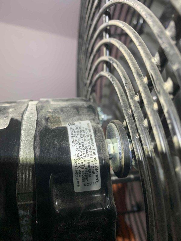 Diagnosed garage heater showing high temperature limit error code. Investigation revealed seized blower fan motor, confirmed with multimeter testing showing capacitance reading of 9.9 μF. Recommended motor replacement and scheduled comfort advisor for follow-up.