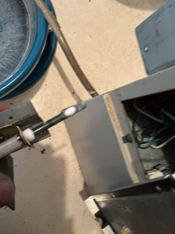 Responded to no-heat call for 25+ year old Gibson furnace. Diagnostic inspection revealed failed igniter as primary cause of heating failure. Customer had previously thawed condensate drain trap. Successfully replaced igniter, restoring proper furnace ignition and system operation. Unit is now functioning normally with heat restored.