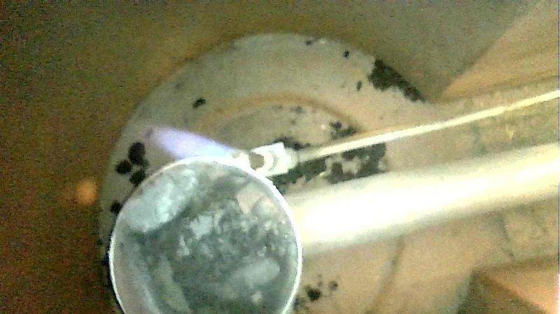 Responded to service call for pilot light repeatedly extinguishing in aging furnace. Upon inspection, discovered significant heat exchanger deterioration with visible cracking and corrosion, along with a failing blower motor with loose belt. Recommended full system replacement as repair costs would approach replacement value. Set up emergency replacement service due to safety concerns.