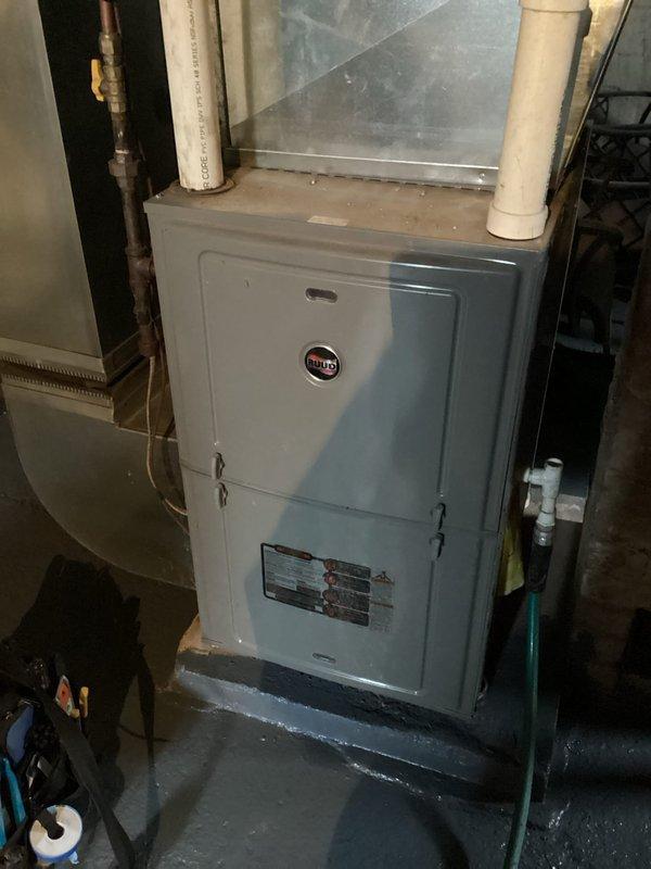 Completed burner assembly replacement on Ruud furnace. Disassembled unit, installed new burners, reassembled and verified proper operation with good flame pattern and restored heating function. System now operating normally.