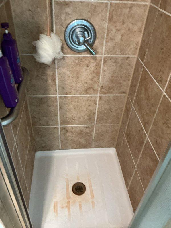 Performed comprehensive plumbing inspection with focus on faucet systems. Identified and cleared debris blockage at fitting where washer and shower drain lines connect, which was causing shower drain backup during washer operation. Augered drain through laundry room standpipe to ensure proper flow. Inspected stainless steel kitchen sink installation and shower stall faucet assembly for proper function.