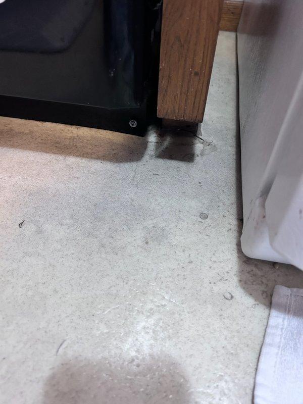 Responded to customer complaint of water leakage from dishwasher. Conducted thorough inspection of unit and surrounding area, noting water staining at floor junction near appliance base. Examined internal components including spray arm assembly and water distribution mechanisms. Despite inspection efforts, could not replicate leaking issue during diagnostic testing. Recommended replacement of dishwasher as most appropriate solution.