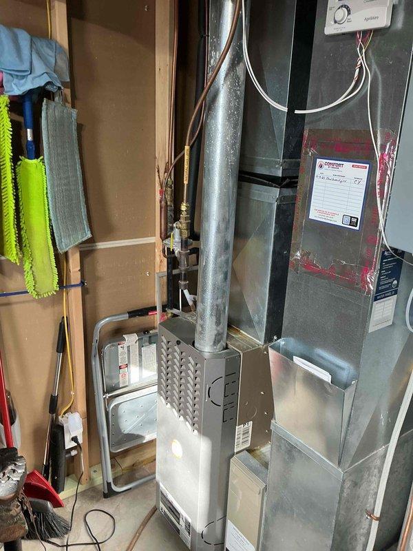 Roberts, WI - Conducted assessment of existing 40-gallon natural gas standard vent water heater, which showed signs of corrosion despite still being operational. Determined a 50-gallon natural gas standard vent water heater would better accommodate growing family needs. Provided replacement options to customer, including potential for combined HVAC and water heater replacement. Customer will consider options presented.