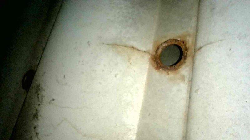 Responded to no heat call for 15+ year old furnace blowing cold air. Diagnostic inspection revealed multiple critical failures including snapped blower motor bracket, cracked inducer disc, and extensive heat exchanger cracking with visible corrosion documented in photographs. Due to safety concerns and multiple component failures, provided replacement options and scheduled service advisor for follow-up consultation.