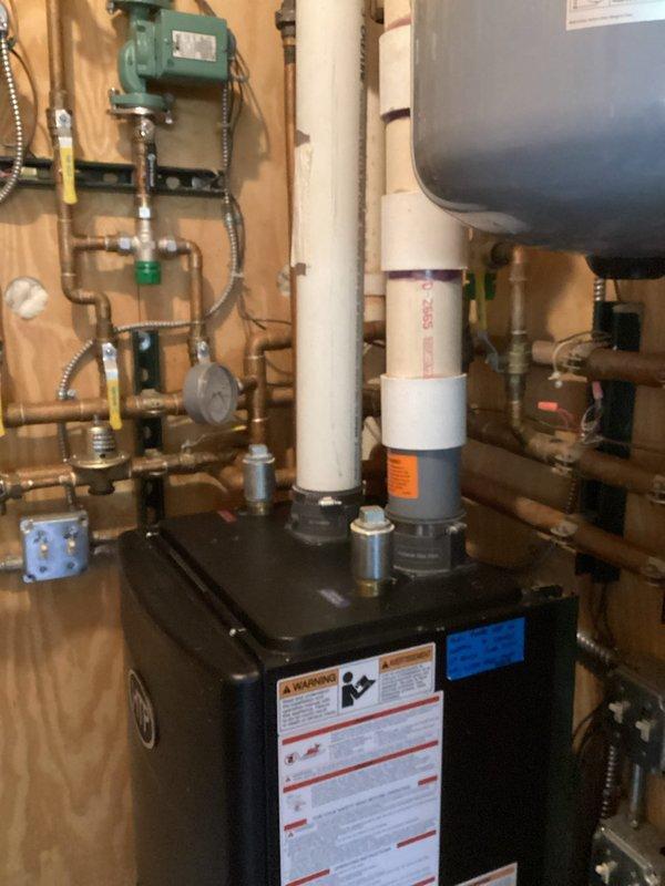 Completed final visit for Fernox chemical treatment on hydronic heating system. Performed comprehensive system flush of all loops and main piping network. Applied Fernox Protector corrosion inhibitor to system. Cycled Grundfos circulator pump and verified proper operation of boiler, expansion tank, and all zone valves. Confirmed system temperatures are within normal operating parameters and all components functioning correctly.